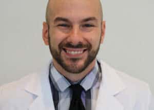 Headshot of Ken Furdich, a professional pharmacist, with a friendly and approachable expression.